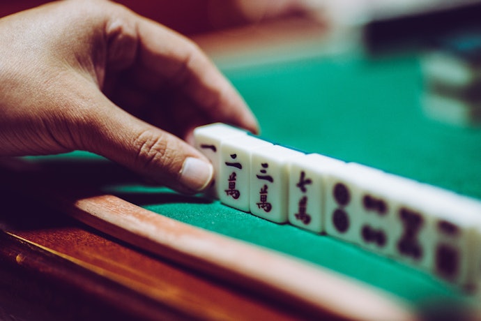 先根據習慣手感挑選麻將的尺寸